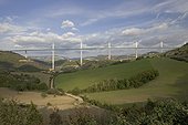 Millau viaduct spanning the Tarn Gorge, southern France. At 336 metres the cable-stayed Viaduc de Millau is the highest bridge in the world and 2.5 kms long. Designed by British architect Sir Norman Foster the viaduct is higher than the Eiffel Tower. Costing 400 millions euros it was competed in December 2004 in 39 months. - Architect Sir Norman Foster