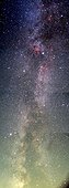 The Milky Way seen from the Northern Hemisphere ; Panoramic view of the Milky Way stretching from Cepheus to Aquila. This portion is visible in the South in summer in Europe. Cygnus is at the zenith. This image is composed of 5 slow shutter photos taken the same night. Notice the light pollution along the horizon, despite the fact the photos were taken at 1600m altitude in Cantal, France.