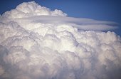 Cumulonimbus and lenticular cloud in summer in Picardy  