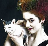 Punk woman and cat Sphinx 