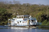 Boat used for fishing or ecotourism Pantanal Brazil ; Pantanal is the greatest wetland of planet