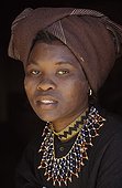 Xhosa woman portrait at Johannesburg in South Africa ; At Lesedi Cultural Village. <br>@ Turban