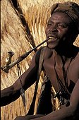 Man Koma doyo smoking the pipe Mounts Alantika Nigeria 