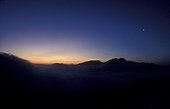 Crescent of the Moon and rising of day above Auvergne ; Seen from the Col du Pas de Peyrol<br>Age of the Moon : 25d 21h