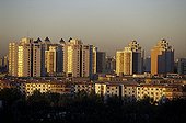 Modern town of Beijingat sunset China 