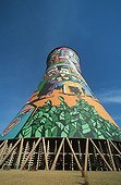 Cooling tower with painted murals depicting Johannesburg
