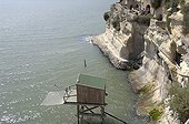 Square fishing net down Meschers cliffs Charente-Maritime