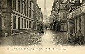 Street under water and Eiffel Tower Flood of Paris in 1910 ; Support : old postcard.