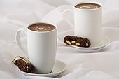 Cups of drinking chocolateand almond and chocolate biscoti