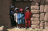Children by a wall Cuzco Region Peru