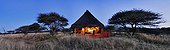 Luxury lodge of The Bush Camp at sunset Namibia