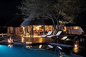 Luxury lodge and swimming pool at night Namibia