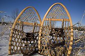 Antique snowshoes stuck in the snow Quebec Canada