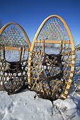 Antique snowshoes stuck in the snow Quebec Canada