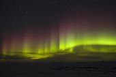 Southern aurora on ice-floe and Lion track Terre Adelie