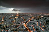 Air shot of Paris under threatening sky France ; Point of view from the top of the Tour Montparnasse