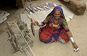 Indian woman of minority Bishnoï spinning cotton Jodhpur
