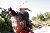Nishi cheaf with Hornbill beak Headdress Arunachal Pradesh ; Place : Road to Ziro