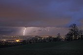 Lightning in a curtain of rain on the country of Gex France 