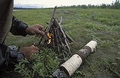 Lighting a fire with birch bark Canada 