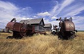 Agricultural machinery and abandoned barn Saskatchewan Canada