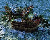 Bouquet in a basket in a garden in winter