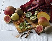 Exotic fruits on a cutting board