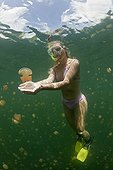 Woman in Jellyfish Lake Palau Micronesia