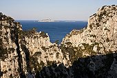 Hole of En Vau in the calanques and island on the skyline ; The island of Riou (to the left) and the island Glides (to the right). The archipelago of Riou is classified in National Wildlife sanctuary