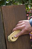 Cleaning of garden furniture with soft soap