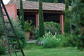 Flowered garden in front of a provencal mas