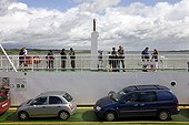 Passengers on a ferryboat on the river Shannon in Ireland