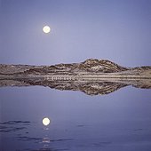 Full moon over the south Namib desert coast Namibia