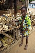Children near a stall like this voodoo rituals in Benin ; It has many heads of animals for rituals 