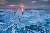 Shards of ice against the rising sun Minnesota USA