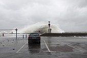 Wave over a dam during the storm Xynthia France ; Xynthia was a violent European windstorm which crossed Western Europe on 26–28 February 2010.