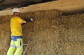 Installation of straw bales in a wood frame house France ; Coated natural lowland bioclimatic energy HQE<br>Orchard House Landscape and Energy 