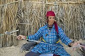 Berber woman spinning wool Tozeur Tunisia