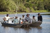 Watching Jaguars boat Encontros das Aguas Pantanal Brazil  ; Search for Jaguars by Boat