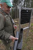 Guard verifying a trap for Spruce bark beetle Podspady