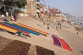 Dungs and linen drying on banks of the Ganges Varanasi India