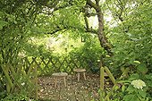 Resting area for children under the Apple Le Jardin des Lianes ; Le jardin des lianes