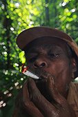 Female Pygmy Baaka, smoking Southeast Cameroon