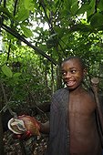 Male pygmy Baaka showing Achatina Cameroon
