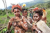 Women with cap and paint  Papua New-Guinea ; Traditional dance Framini school called singsing 