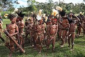 Children with feather headdress and paint  Papua New-Guinea ; Children before going to the jury.<br>Traditional dance Framini school called singsing