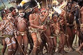 Children dancing with hat and bow Papua New-Guinea ; Traditional dance Framini school called singsing