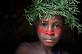 Boy with cap and paint Papua New-Guinea