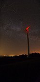 Three Summer Beauty over a wind turbine ; Three Summer Beauty of Grand Summer Triangle in the heart of the Milky Way. The Dragon is partially visible at the top of the image.