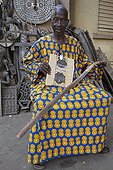 Man and articles snakeskin on a stall Bamako Mali 